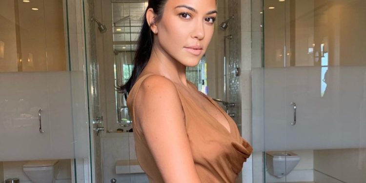 Jennifer Lopez Compliments Kourtney Kardashian’s Booty As She Poses Topless In JLo Skinny Jeans