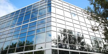4 Ways Commercial Window Tinting Can Help You to Cut Down on Your Energy Costs